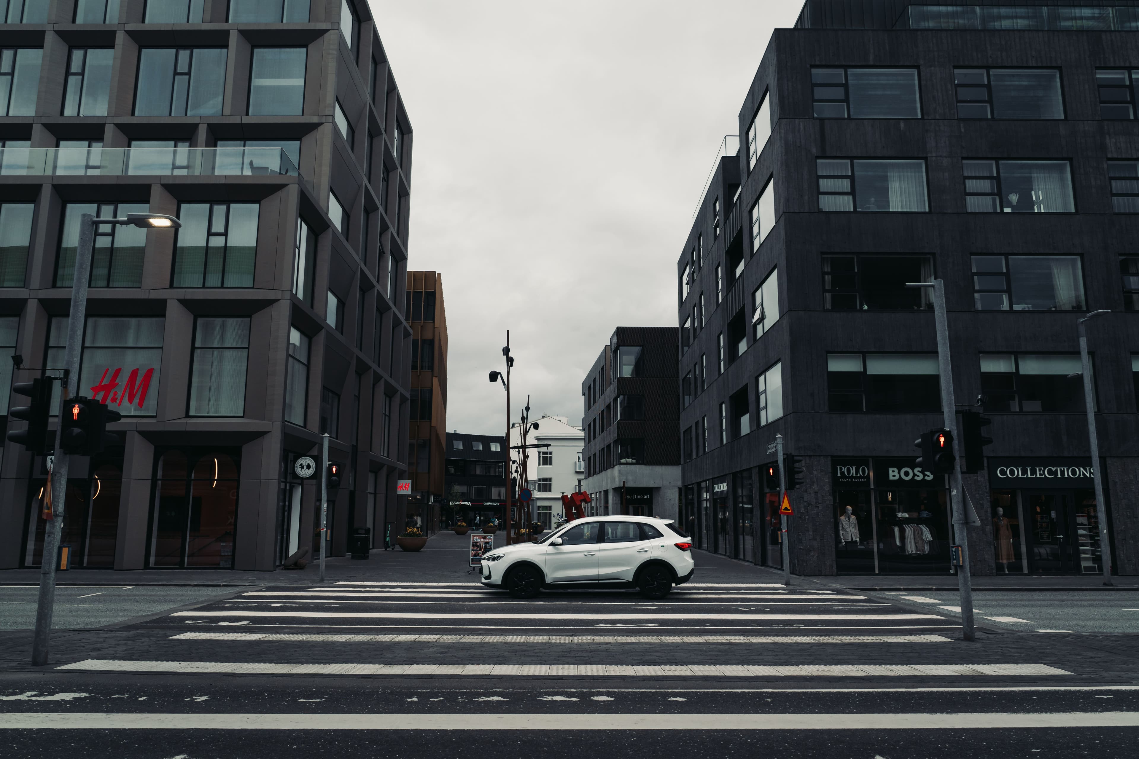 A car driving on the main street downtown in Reykjavik
