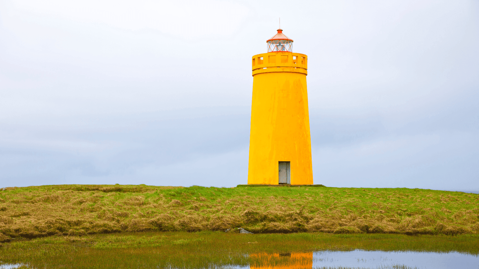 Bright yellow lighthouse in Iceland