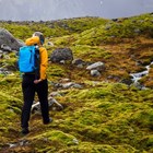 Hiking in Iceland on mossy rocks 