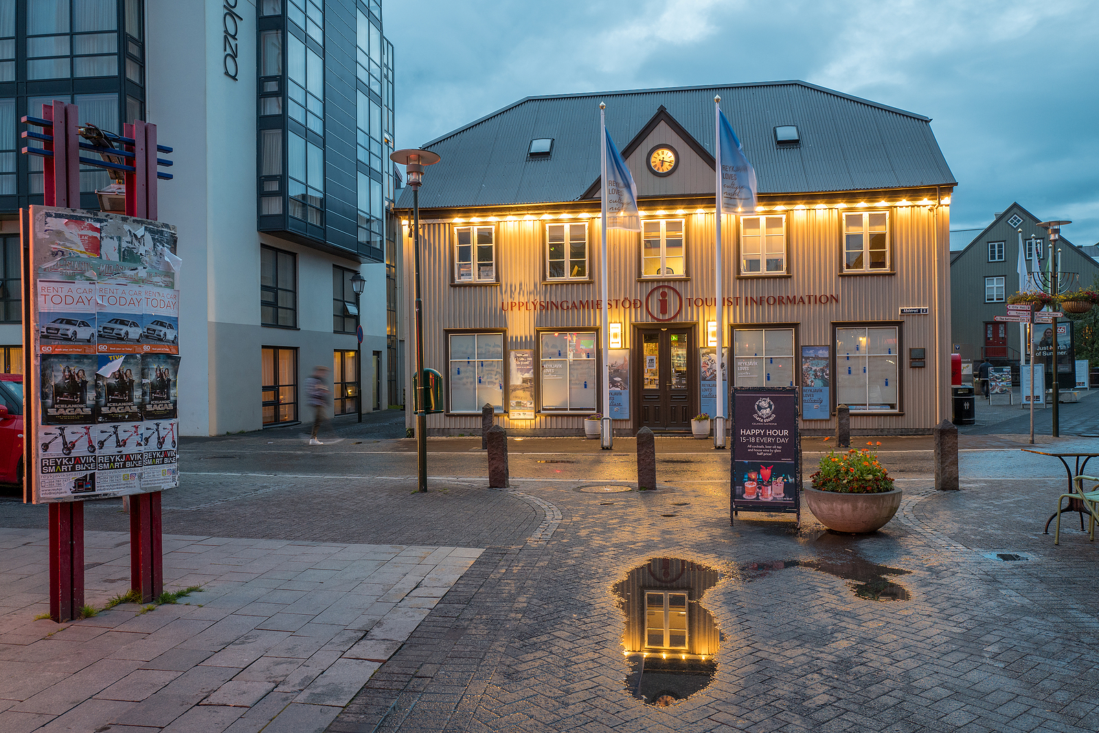 Ingolfstorg square at dusk in Reykjavik.