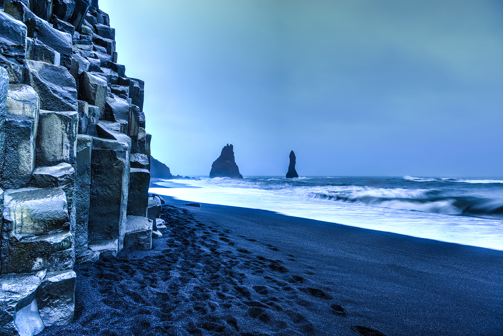  Reynisdrangar rock formations in winter.