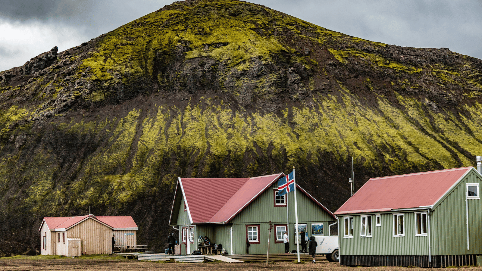Green hiking huts in the Highlands.