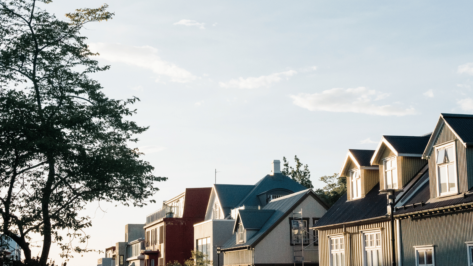 Midnight Sun over houses in Reykjavik.