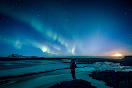 People watching northern lights in Iceland