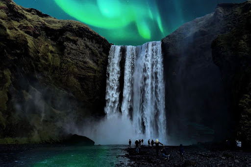 Northern lights over waterfall Iceland