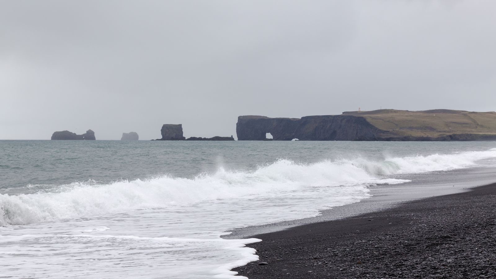 Waves crashing on Reynisfjara beach in Iceland.