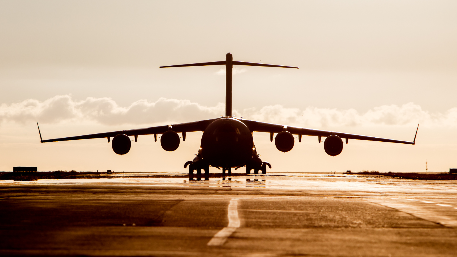 An aeroplane on a runway.