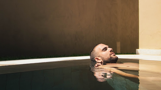 Man relaxing in a spa pool.