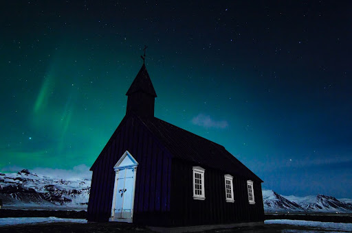 Church of Budir under Northern Lights, Iceland